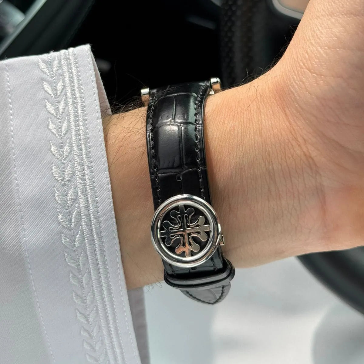 Patek Philippe Men’s Black Sunray Dial Silver-Tone Watch